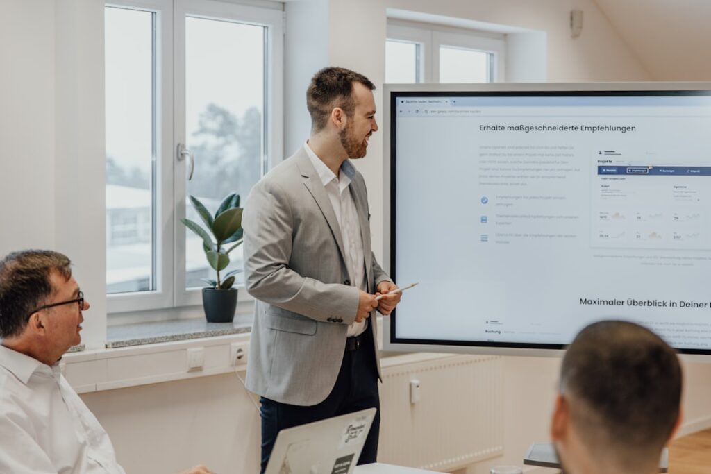 digital marketing strategies - a man giving a presentation to a group of people
