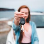 how to get a loaner car from dealership - focus photography of black vehicle key