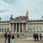 how to get germany free scholarship - People are gathered in front of a german building.