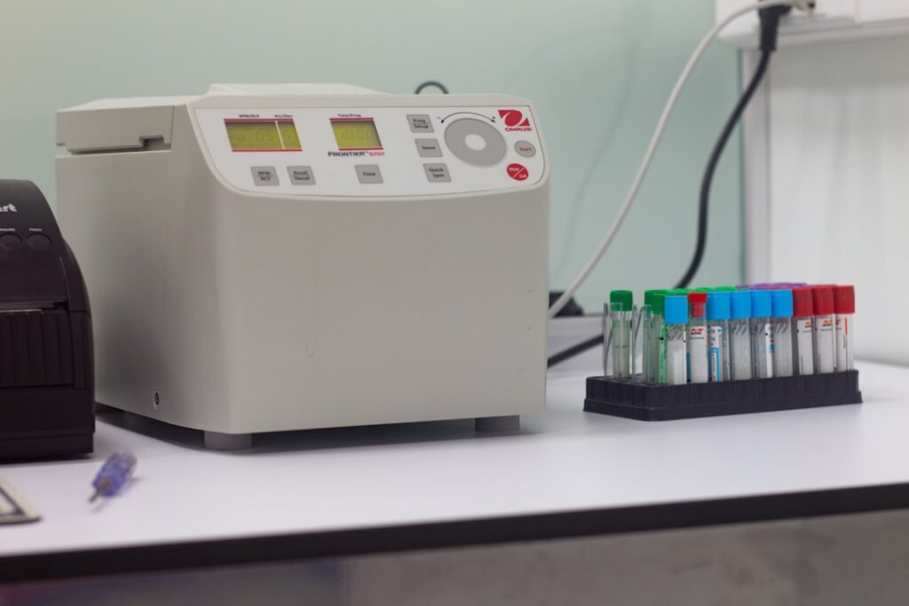 test simple generator - a white electronic device with a screen and buttons on a white surface